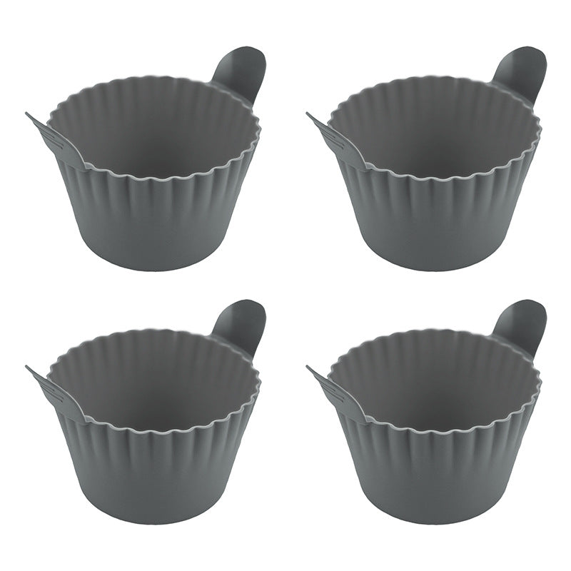 OutinBrew™ silicone air fryer liners inside air fryer basket with cooked food