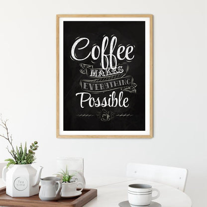 Print in a light wood frame on a white wall above a table styled with a tea set and small plants
