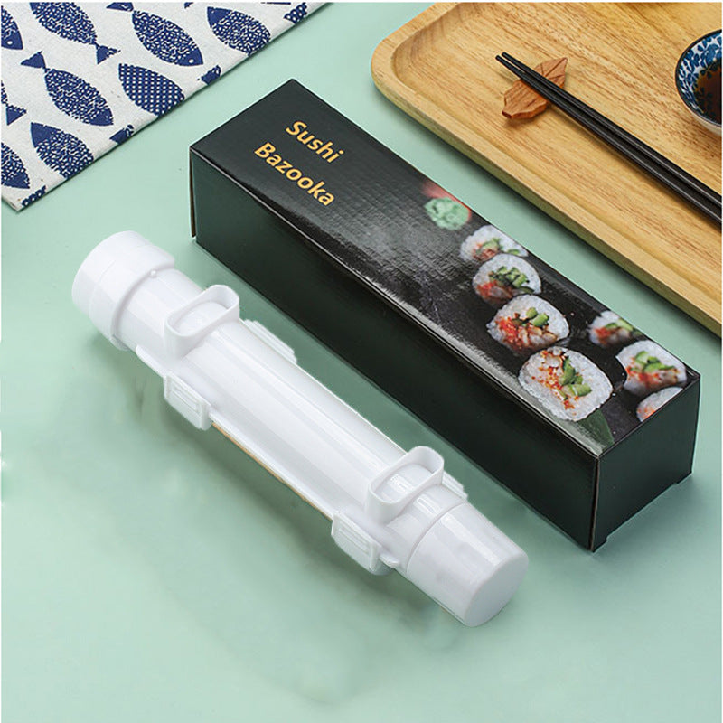 White sushi making tool with its Sushi Bazooka packaging box