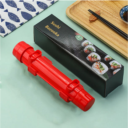 Red sushi making tool with its Sushi Bazooka packaging box