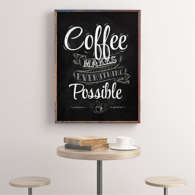 Print in a distressed wood frame hanging above a small cafe table with books and a coffee cup