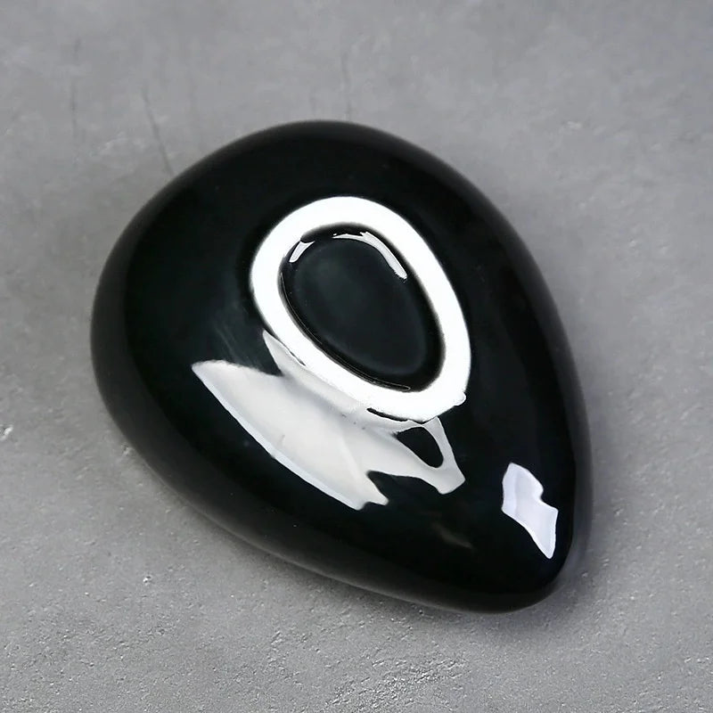 Multiple ceramic dosing cups displayed in different colors