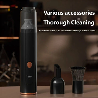 Coffee grinder cleaner on a table with its nozzle and brush attachments removed