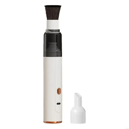 White coffee grinder cleaner with brush head and nozzle attachment on a white background