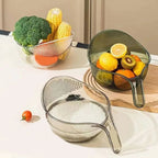 Three colander bowls on a kitchen counter holding broccoli and corn, citrus fruit, and rice