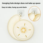 Close-up of the basket's built-in hanging hole mounted on an adhesive wall hook