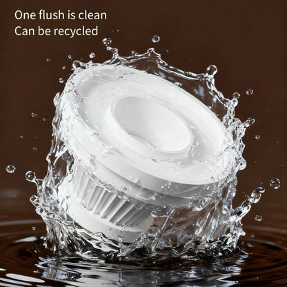 White filter piece splashing in water, showing it can be rinsed clean and reused